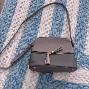 Chic Gray Crossbody Bag with Tassel Accent